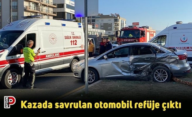 Kazada savrulan otomobil refüje çıktı