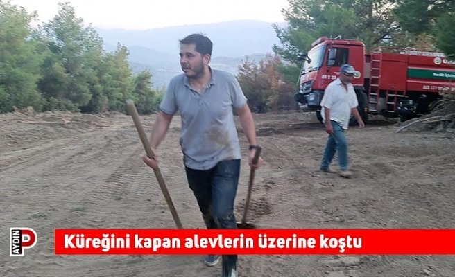 Küreğini kapan alevlerin üzerine koştu