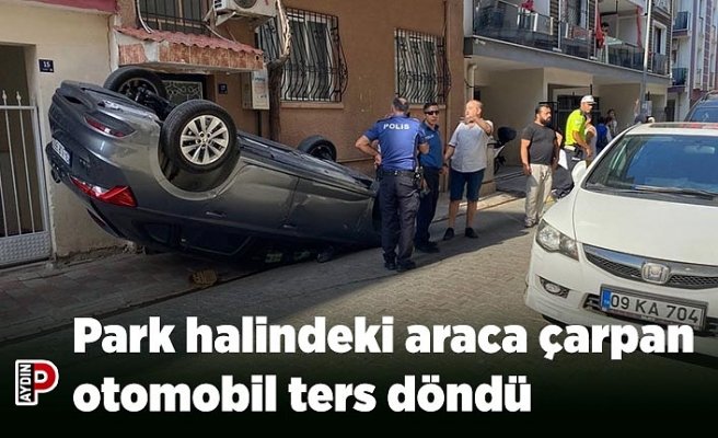 Park halindeki araca çarpan otomobil ters döndü