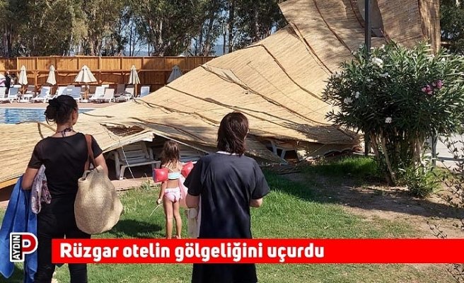 Rüzgar otelin gölgeliğini uçurdu
