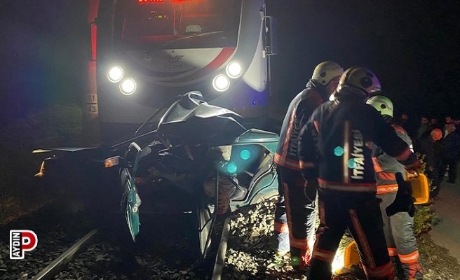 Trenin altında kalan otomobil sürücüsü hayatını kaybetti