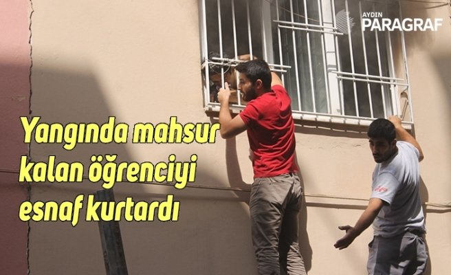 Yangında mahsur kalan öğrenciyi esnaf kurtardı