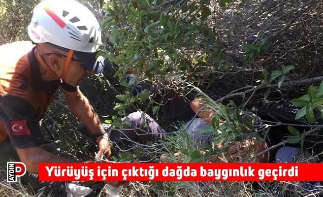 Yürüyüş için çıktığı dağda baygınlık geçirdi